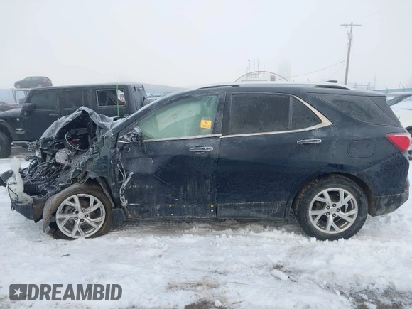 2021 Chevrolet Equinox Premier z VIN 3GNAXXEV2MS137119, wystawiony jako IAAI lot #41344057 z przebiegiem Nie podano mil oraz . Historia ofert i sprzedaży dostępna na DreamBid. Obrazek 14.