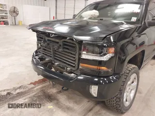2017 Chevrolet Silverado 1500 LT with VIN 3GCUKREC6HG501307, listed as a IAAI auction lot 41611899 with 133,863 mi miles and . Bid and sale history available at DreamBid. Image 18.