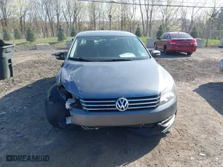 2013 Volkswagen Passat SE with VIN 1VWBP7A36DC039148, listed as a IAAI auction lot 42075823 with 196,734 mi miles. Bid and sale history available at carsss.com. Image 6.