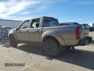2004 Nissan Frontier XE z VIN 1N6ED27T94C461253, wystawiony jako Copart lot #86311014 z przebiegiem 174 836 mil mil oraz Szkoda całkowita • Salvage title. Historia ofert i sprzedaży dostępna na DreamBid. Obrazek 2.