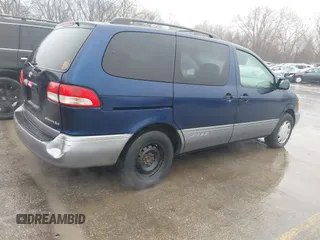 2002 Toyota Sienna LE with VIN 4T3ZF13C72U424470, listed as a IAAI auction lot 41508436 with 170,177 mi miles. Bid and sale history available at carsss.com. Image 4.
