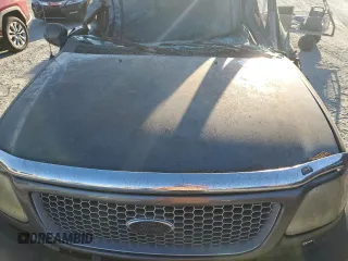 2002 Ford F-150 XL with VIN 1FTRF17W42NA89079, listed as a Copart auction lot 76519634 with Not Provided miles and Salvage Title. Bid and sale history available at carsss.com. Image 11.