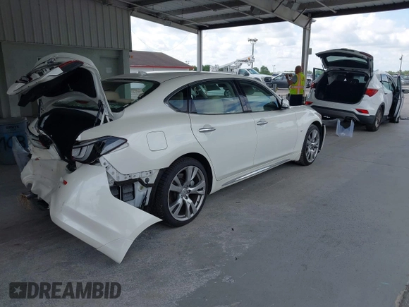 2018 Infiniti Q70 Luxe with VIN JN1BY1PP4JM330361, listed as a IAAI auction lot 42469866 with 69,986 mi miles and . Bid and sale history available at DreamBid. Image 4.
