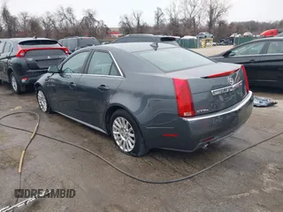 2011 Cadillac CTS Sedan Luxury with VIN 1G6DG5EY7B0163601, listed as a IAAI auction lot 41536256 with 106,523 mi miles. Bid and sale history available at carsss.com. Image 3.