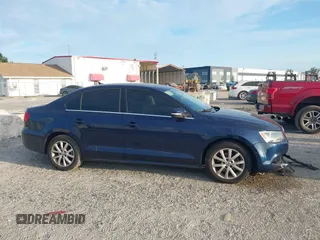 2014 Volkswagen Jetta SE with VIN 3VWD07AJ6EM417996, listed as a IAAI auction lot 42723125 with 108,952 mi miles and . Bid and sale history available at DreamBid. Image 13.