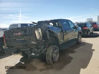 2021 GMC Sierra 1500 AT4 with VIN 3GTU9EET9MG370548, listed as a Copart auction lot 48034845 with 53,406 mi miles and Salvage Title. Bid and sale history available at carsss.com. Image 3.