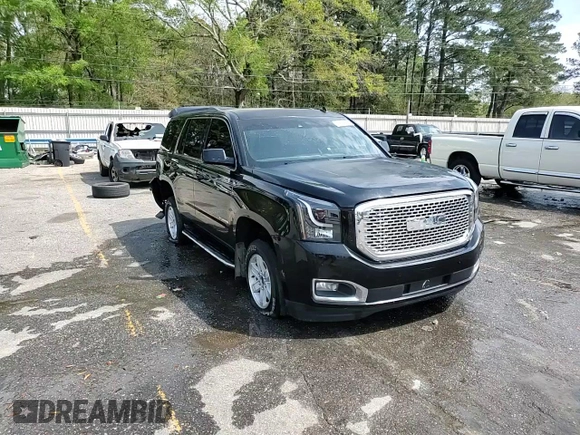 2015 GMC Yukon SLT with VIN 1GKS1BKC0FR113013, listed as a Copart auction lot 49821495 with 294,596 mi miles and Salvage Title. Bid and sale history available at carsss.com. Image 15.