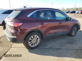 2021 Ford Escape SE with VIN 1FMCU9G67MUA94906, listed as a Copart auction lot 54310725 with 84,595 mi miles and Salvage title. Bid and sale history available at DreamBid. Image 3.