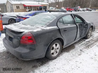 2005 Pontiac Grand Prix GT with VIN 2G2WS522451178087, listed as a IAAI auction lot 41033584 with 88,554 mi miles. Bid and sale history available at carsss.com. Image 4.