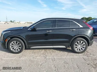2020 Cadillac XT4 FWD Premium Luxury with VIN 1GYFZCR44LF070832, listed as a IAAI auction lot 41249608 with 77,471 mi miles. Bid and sale history available at carsss.com. Image 14.