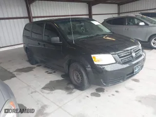 2010 Dodge Grand Caravan SE with VIN 2D4RN4DE0AR363057, listed as a IAAI auction lot 42025813 with 201,867 mi miles. Bid and sale history available at carsss.com. Image 1.