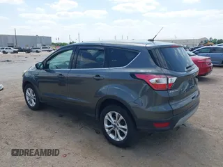 2017 Ford Escape SE z VIN 1FMCU0GD1HUE71410, wystawiony jako IAAI lot #42026516 z przebiegiem 173 804 mil mil oraz . Historia ofert i sprzedaży dostępna na DreamBid. Obrazek 3.