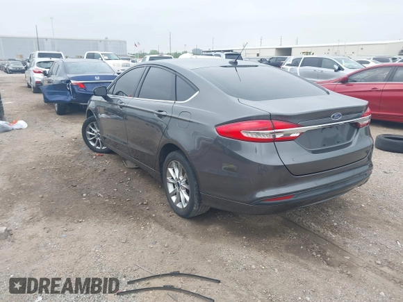 2017 Ford Fusion SE with VIN 3FA6P0H77HR237562, listed as a IAAI auction lot 41811923 with 120,440 mi miles and . Bid and sale history available at DreamBid. Image 3.