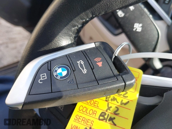 2022 BMW X2 sDrive28i z VIN WBXYH9C00N5U57853, wystawiony jako IAAI lot #41958326 z przebiegiem 49 518 mil mil oraz . Historia ofert i sprzedaży dostępna na DreamBid. Obrazek 11.