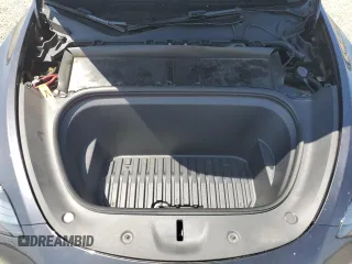 2024 Tesla Model Y с VIN 7SAYGDEDXRF095167, выставлен на аукционе Copart как лот 61676245 с пробегом 12 988 миль миль и Списание • Salvage title. История ставок и продаж доступна на DreamBid. Изображение 11.