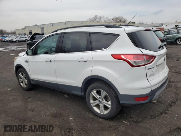 2016 Ford Escape SE with VIN 1FMCU9G91GUC68547, listed as a Copart auction lot 52770635 with 100,111 mi miles and Salvage Title. Bid and sale history available at DreamBid. Image 2.