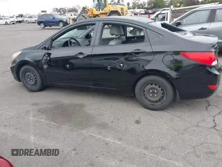 2015 Hyundai Accent GLS z VIN KMHCT4AE8FU827019, wystawiony jako IAAI lot #42179517 z przebiegiem 52 039 mil mil oraz . Historia ofert i sprzedaży dostępna na DreamBid. Obrazek 14.