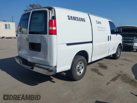 2016 Chevrolet Express Cargo Van with VIN 1GCWGAFF0G1323959, listed as a IAAI auction lot 42172260 with 211,384 mi miles. Bid and sale history available at carsss.com. Image 4.