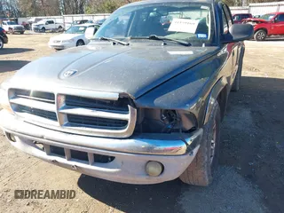 2003 Dodge Dakota SLT with VIN 1D7HL48X03S174569, listed as a IAAI auction lot 41159169 with 156,551 mi miles. Bid and sale history available at carsss.com. Image 6.