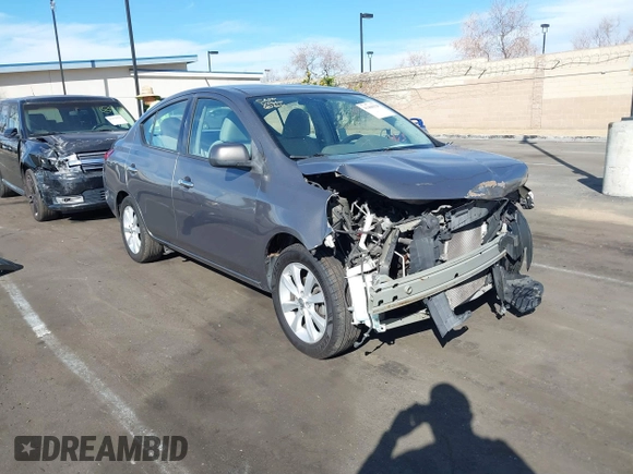 2014 Nissan Versa S with VIN 3N1CN7APXEL817010, listed as a IAAI auction lot 41460129 with 137,040 mi miles. Bid and sale history available at carsss.com. Image 1.