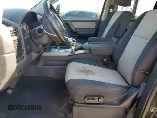 2012 Nissan Titan SV with VIN 1N6BA0EC6CN312465, listed as a Copart auction lot 58722815 with 186,207 mi miles and Salvage title. Bid and sale history available at DreamBid. Image 7.