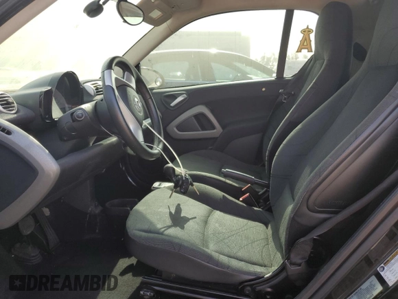 2014 Smart fortwo Pure z VIN WMEEJ3BA3EK780633, wystawiony jako Copart lot #54009185 z przebiegiem 104 688 mil mil oraz Tytuł czysty. Historia ofert i sprzedaży dostępna na DreamBid. Obrazek 7.