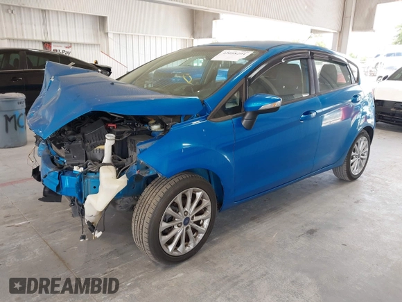 2014 Ford Fiesta SE with VIN 3FADP4EJ7EM204438, listed as a IAAI auction lot 42098291 with 184,930 mi miles and . Bid and sale history available at DreamBid. Image 18.