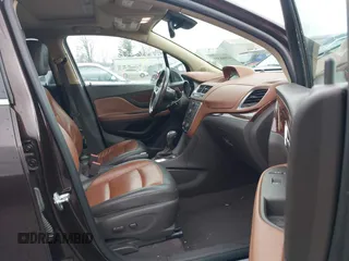 2013 Buick Encore Leather with VIN KL4CJCSB0DB144646, listed as a IAAI auction lot 41668384 with 122,082 mi miles and . Bid and sale history available at carsss.com. Image 5.