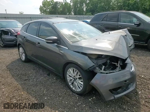 2018 Ford Focus Titanium z VIN 1FADP3N20JL271719, wystawiony jako Copart lot #60784755 z przebiegiem 116 118 mil mil oraz Szkoda całkowita • Salvage title. Historia ofert i sprzedaży dostępna na DreamBid. Obrazek 13.