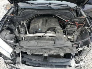 2015 BMW X5 xDrive35i z VIN 5UXKR0C59F0P13587, wystawiony jako Copart lot #57224415 z przebiegiem 155 131 mil mil oraz Szkoda całkowita • Salvage title. Historia ofert i sprzedaży dostępna na DreamBid. Obrazek 12.