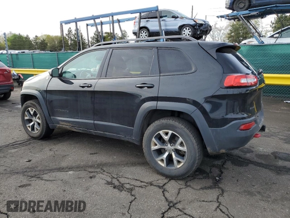 2015 Jeep Cherokee Trailhawk with VIN 1C4PJMBS9FW521872, listed as a Copart auction lot 55338955 with 146,602 mi miles and Salvage title. Bid and sale history available at DreamBid. Image 2.