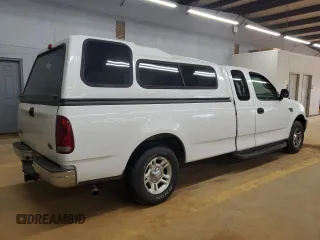 2001 Ford F-150 XL with VIN 1FTRX17L51NB25752, listed as a Copart auction lot 48721235 with 179,941 mi miles and Salvage title. Bid and sale history available at DreamBid. Image 3.