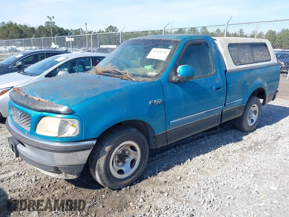 1997 Ford F-150 with VIN 1FTDF1768VNA92419, listed as a IAAI auction lot 41468196 with 91,943 mi miles and . Bid and sale history available at DreamBid. Image 2.
