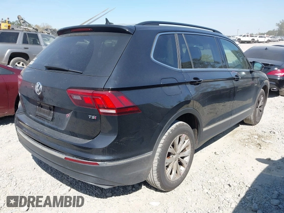 2018 Volkswagen Tiguan SEL with VIN 3VV3B7AX9JM095251, listed as a IAAI auction lot 41871121 with 59,000 mi miles and . Bid and sale history available at DreamBid. Image 4.