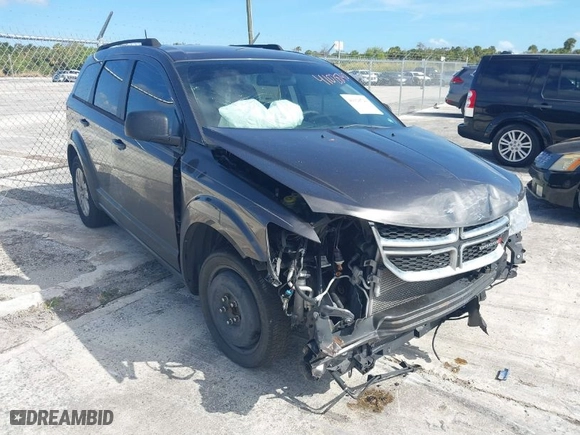 2019 Dodge Journey SE Value Pkg with VIN 3C4PDCAB7KT747315, listed as a IAAI auction lot 41028740 with 143,469 mi miles. Bid and sale history available at carsss.com. Image 17.