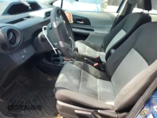 2012 Toyota Prius One z VIN JTDKDTB39C1507466, wystawiony jako Copart lot #55726175 z przebiegiem Nie podano mil oraz Szkoda całkowita • Salvage title. Historia ofert i sprzedaży dostępna na DreamBid. Obrazek 7.