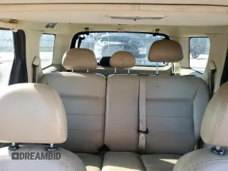 2006 Ford Escape Limited with VIN 1FMYU04116KA40963, listed as a Copart auction lot 61600525 with 208,696 mi miles and Salvage title. Bid and sale history available at DreamBid. Image 10.