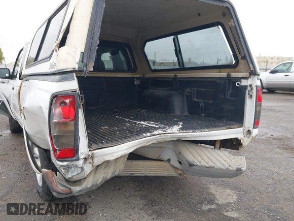 2004 Nissan Frontier XE with VIN 1N6DD26T54C403203, listed as a IAAI auction lot 41658314 with 203,648 mi miles and . Bid and sale history available at DreamBid. Image 6.