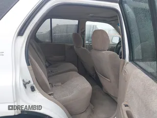 2001 Isuzu Rodeo S with VIN 4S2DM58WX14315138, listed as a IAAI auction lot 41535619 with 217,960 mi miles and . Bid and sale history available at DreamBid. Image 8.