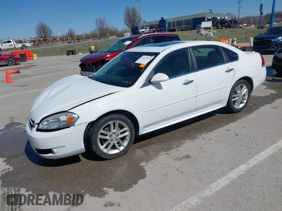 2014 Chevrolet Impala LTZ with VIN 2G1WC5E36E1182793, listed as a IAAI auction lot 41817899 with 171,776 mi miles and . Bid and sale history available at DreamBid. Image 19.