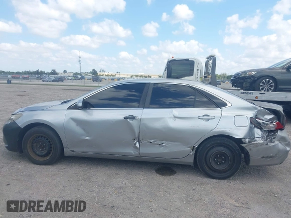 2015 Toyota Camry XLE with VIN 4T1BF1FK0FU093475, listed as a IAAI auction lot 42061877 with 131,618 mi miles. Bid and sale history available at carsss.com. Image 14.
