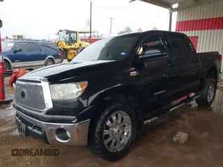 2012 Toyota Tundra 4WD Truck with VIN 5TFDW5F1XCX253223, listed as a IAAI auction lot 41453842 with 163,730 mi miles. Bid and sale history available at carsss.com. Image 19.