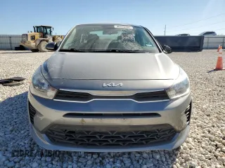 2022 Kia Rio S with VIN 3KPA24ADXNE477511, listed as a Copart auction lot 48555265 with 32,147 mi miles and Salvage Title. Bid and sale history available at carsss.com. Image 5.