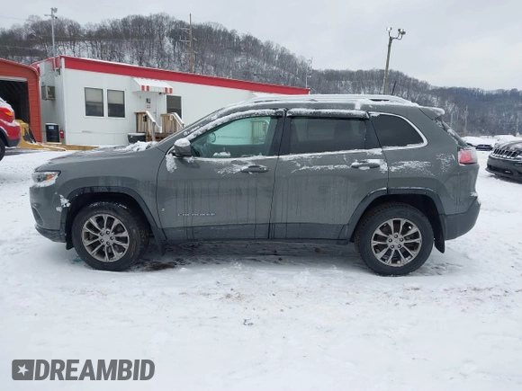 2019 Jeep Cherokee Latitude Plus with VIN 1C4PJMLB9KD399289, listed as a IAAI auction lot 41314743 with 84,726 mi miles. Bid and sale history available at carsss.com. Image 14.