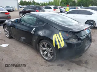 2011 Nissan 370Z Touring with VIN JN1AZ4EH3BM550677, listed as a IAAI auction lot 42217431 with 182,904 mi miles and . Bid and sale history available at DreamBid. Image 3.