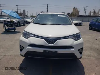 2018 Toyota RAV4 XLE with VIN JTMWFREVXJD118021, listed as a Copart auction lot 58845805 with 108,068 mi miles and Salvage title. Bid and sale history available at DreamBid. Image 5.