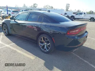 2015 Dodge Charger SXT with VIN 2C3CDXHG9FH915191, listed as a IAAI auction lot 41850427 with 164,535 mi miles and . Bid and sale history available at DreamBid. Image 3.