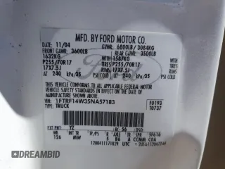 2005 Ford F-150 XL with VIN 1FTRF14W35NA57183, listed as a Copart auction lot 54779225 with Not provided miles and Salvage title. Bid and sale history available at DreamBid. Image 12.