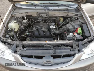 2002 Mazda Tribute LX with VIN 4F2YU09142KM22895, listed as a Copart auction lot 73797364 with 176,514 mi miles and Salvage Title. Bid and sale history available at carsss.com. Image 12.