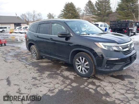 2020 Honda Pilot EX-L z VIN 5FNYF6H50LB022798, wystawiony jako IAAI lot #41592012 z przebiegiem 67 045 mil mil oraz . Historia ofert i sprzedaży dostępna na DreamBid. Obrazek 1.